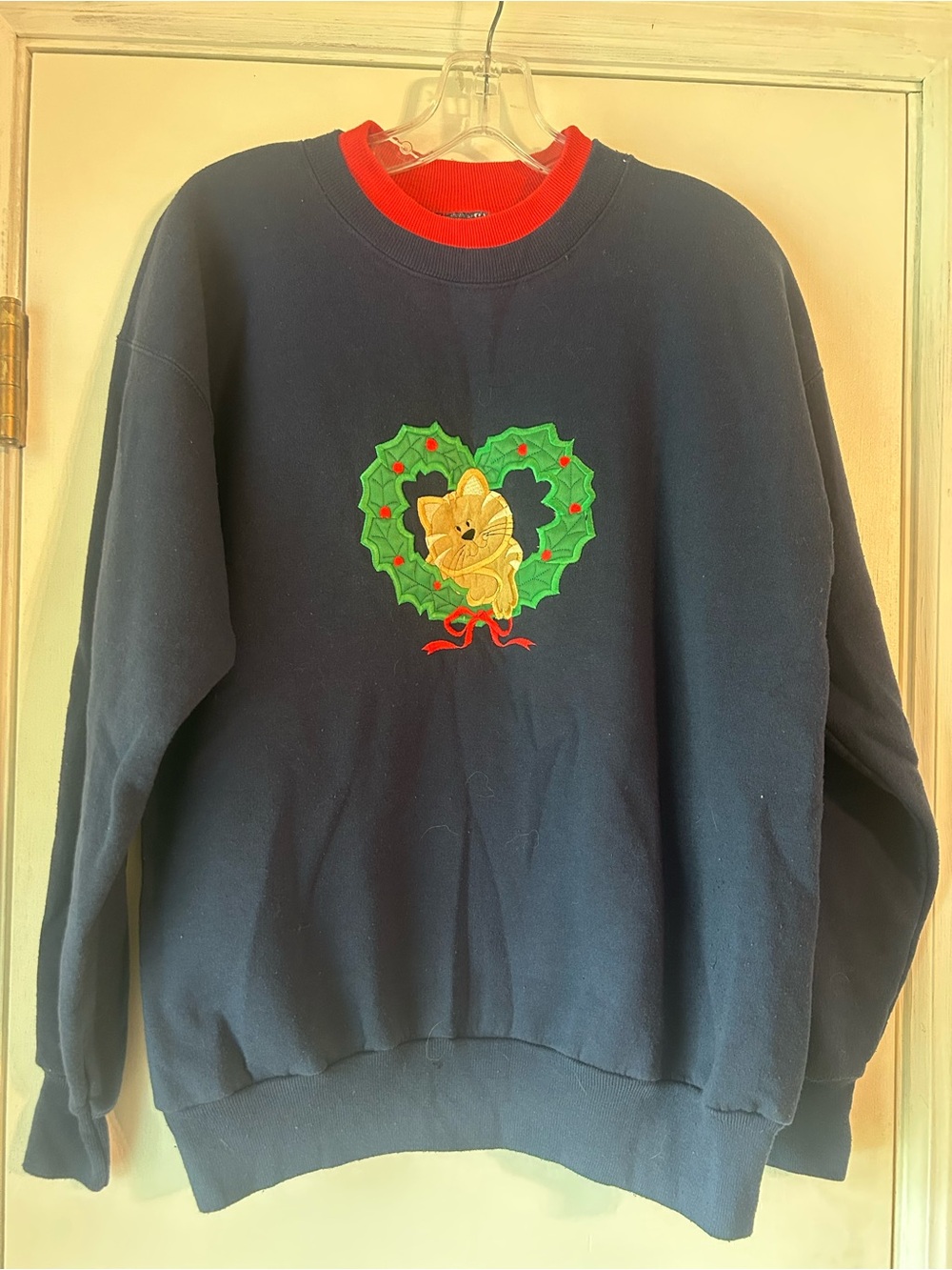 Navy Crewneck Sweater with Red Trim and Wreath Kitten Motif